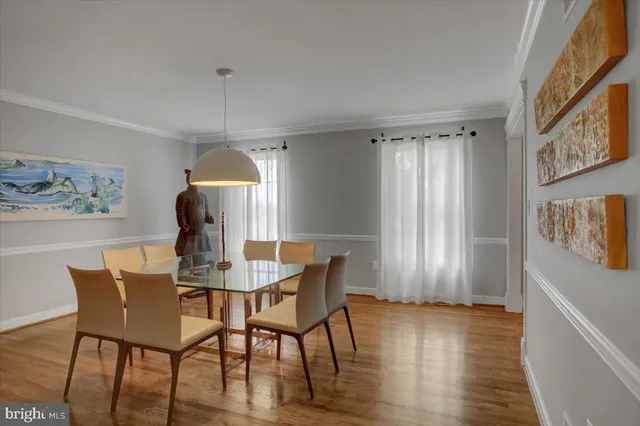 a work room with furniture and wooden floor