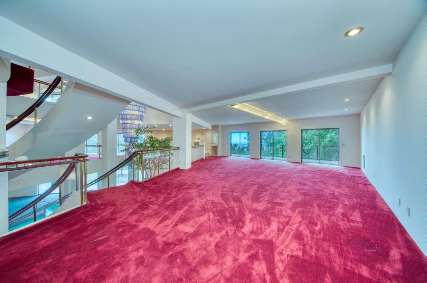 800 El Granada Boulevard El Granada, CA 94019 - Photo 17 of 57 a view of an empty room with a window and fireplace