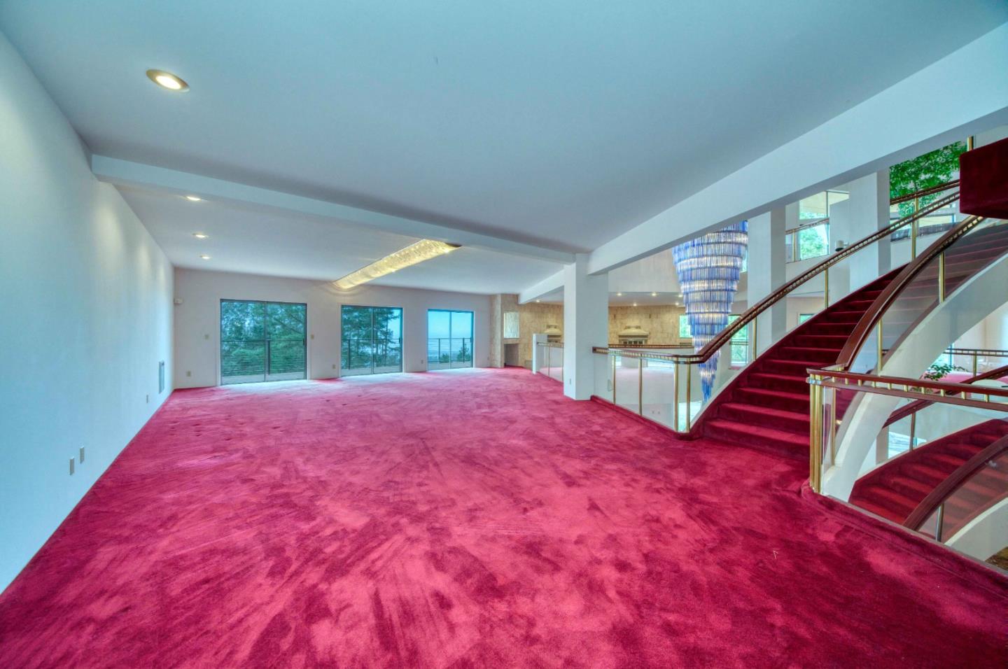 800 El Granada Boulevard El Granada, CA 94019 - Photo 18 of 57 a view of empty room with wooden floor and fan