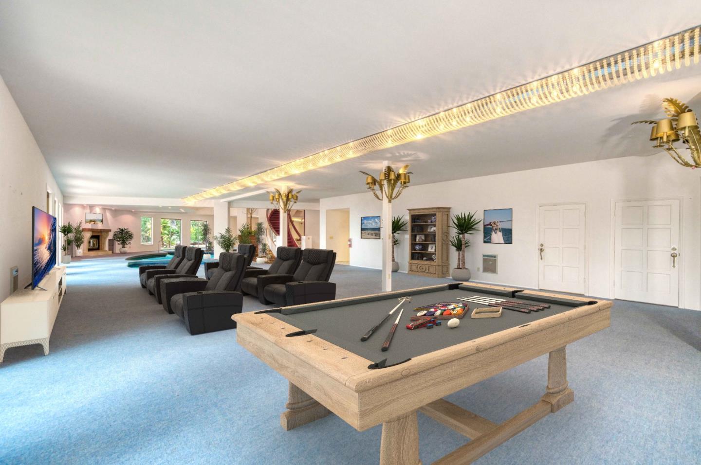 800 El Granada Boulevard El Granada, CA 94019 - Photo 29 of 57 a living room with furniture and flat screen tv