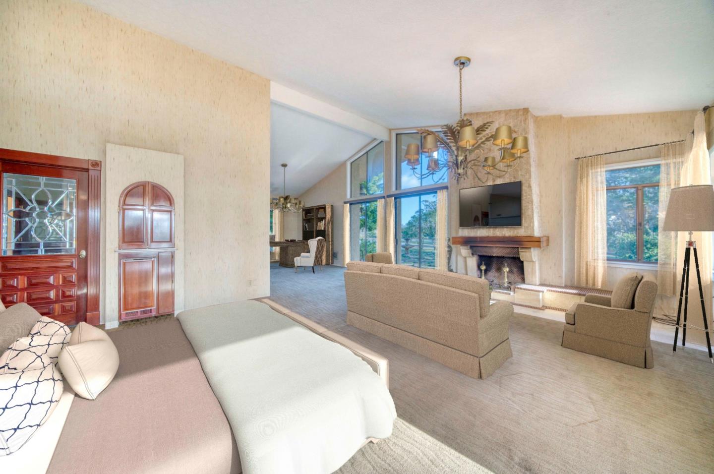 800 El Granada Boulevard El Granada, CA 94019 - Photo 31 of 57 a living room with furniture a flat screen tv and a floor to ceiling window