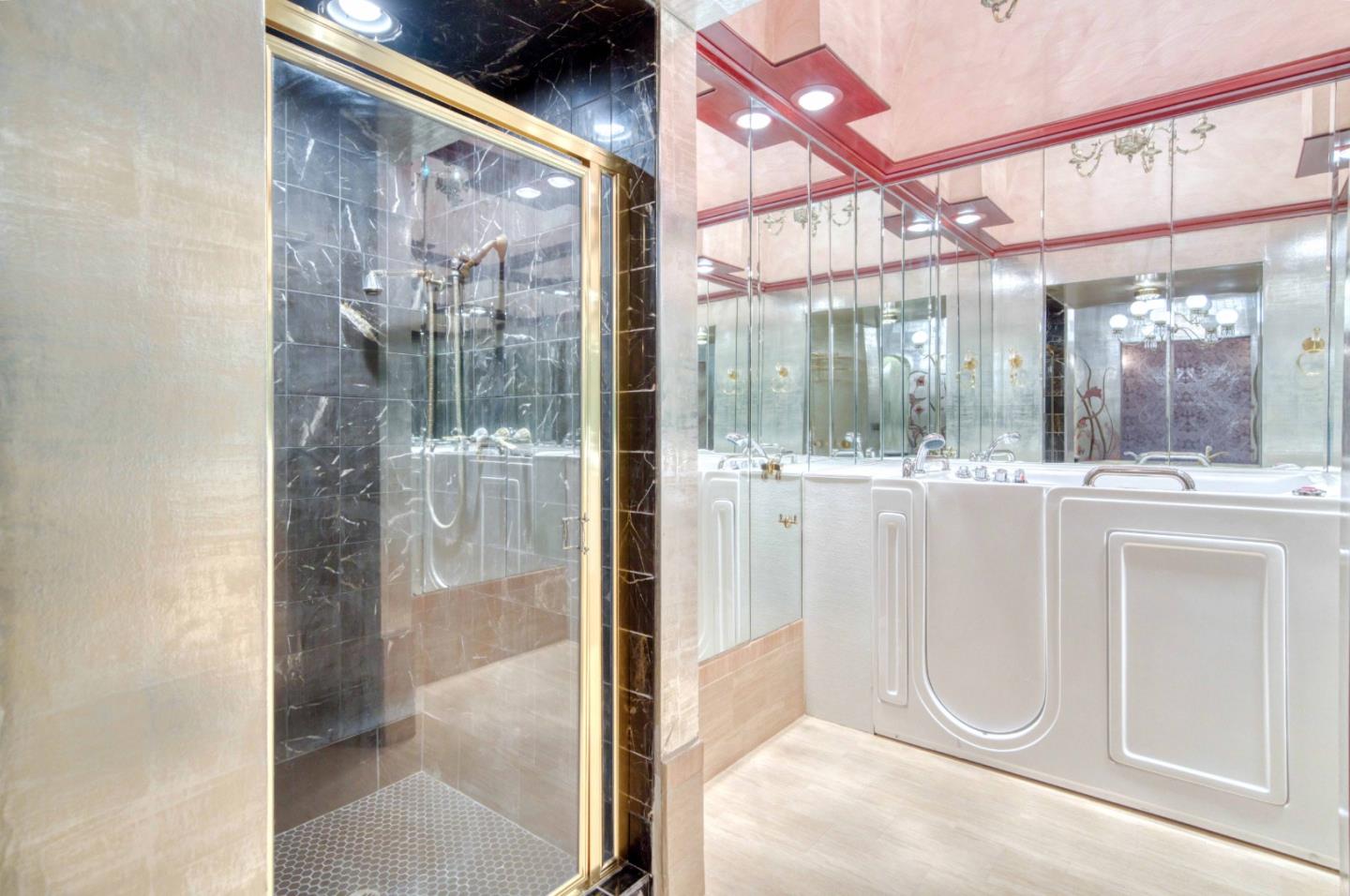 800 El Granada Boulevard El Granada, CA 94019 - Photo 35 of 57 a bathroom with a glass shower door