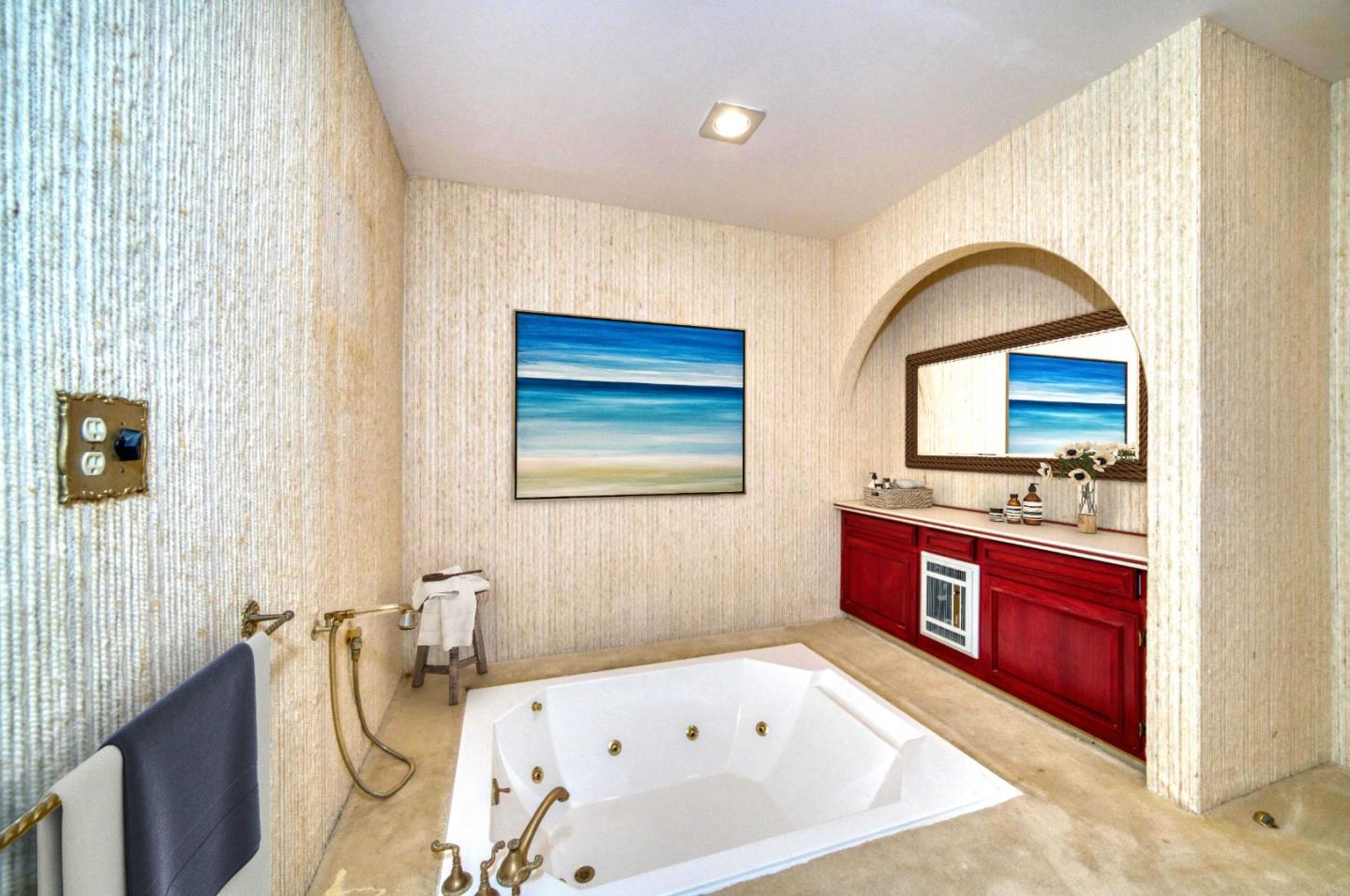 800 El Granada Boulevard El Granada, CA 94019 - Photo 47 of 57 a bathroom with a tub sink and mirror