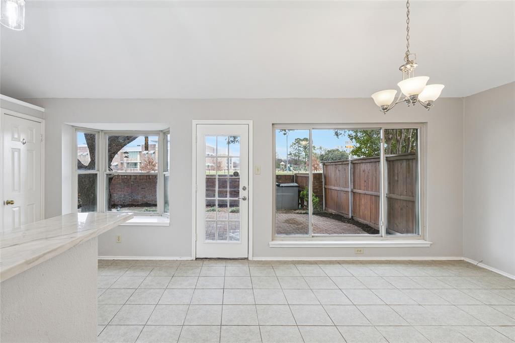 356 Arbor Court Euless, TX 76039 - Photo 12 of 37 Dining area with tons of light from windows overlooking patio perfect for al fresco dining
