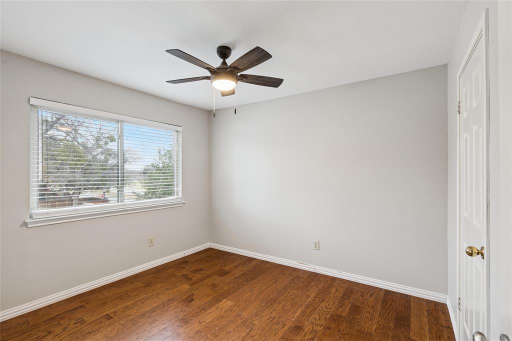 356 Arbor Court Euless, TX 76039 - Photo 24 of 37 2nd Bedroom with large window and closet