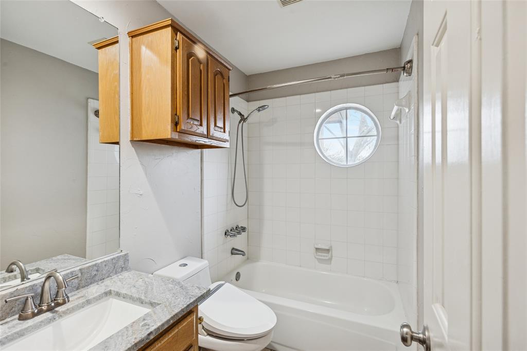 356 Arbor Court Euless, TX 76039 - Photo 26 of 37 Upstairs bathroom with tub and shower combination