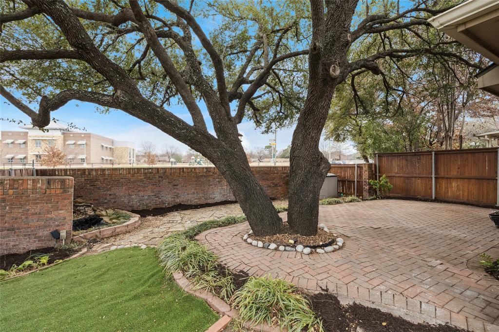 356 Arbor Court Euless, TX 76039 - Photo 33 of 37 View from side yard to back of the yard off the patio area