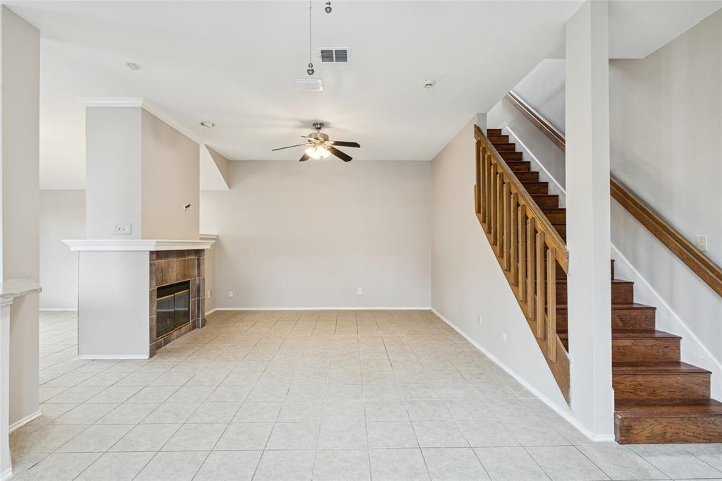 356 Arbor Court Euless, TX 76039 - Photo 6 of 37 Open view of living an dining room with see through fireplace