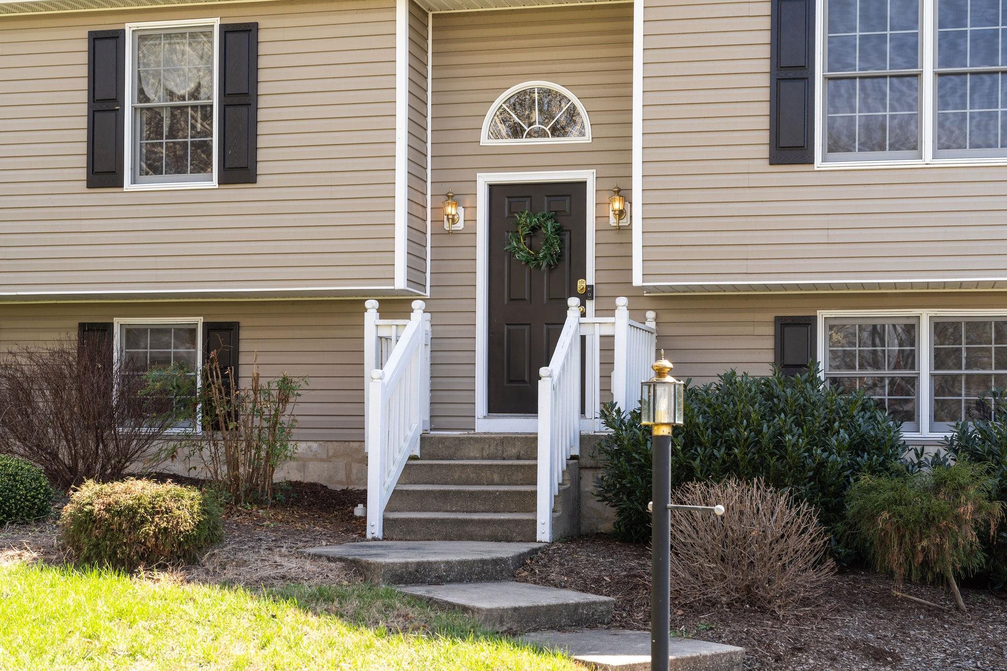 162 Cold Springs Road Stuarts Draft, VA 24477 - Photo 2 of 33 a front view of a house with garden