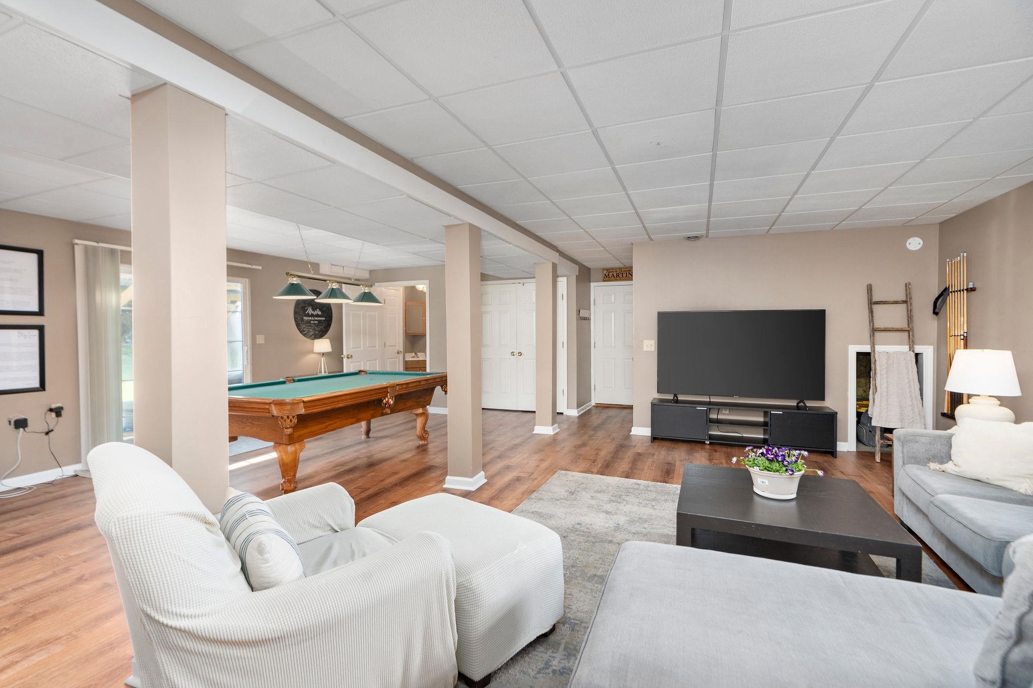 162 Cold Springs Road Stuarts Draft, VA 24477 - Photo 23 of 33 a living room with furniture and a flat screen tv
