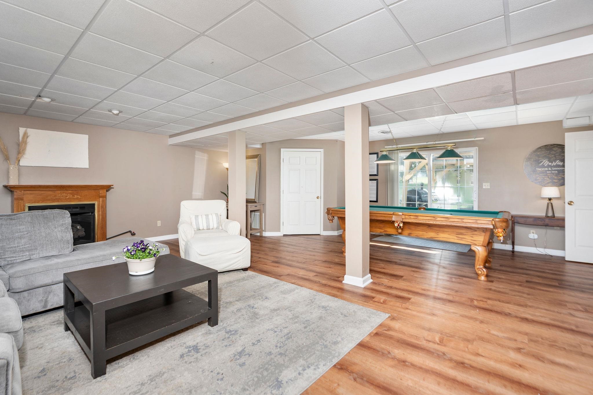 162 Cold Springs Road Stuarts Draft, VA 24477 - Photo 24 of 33 a living room with furniture and a wooden floor