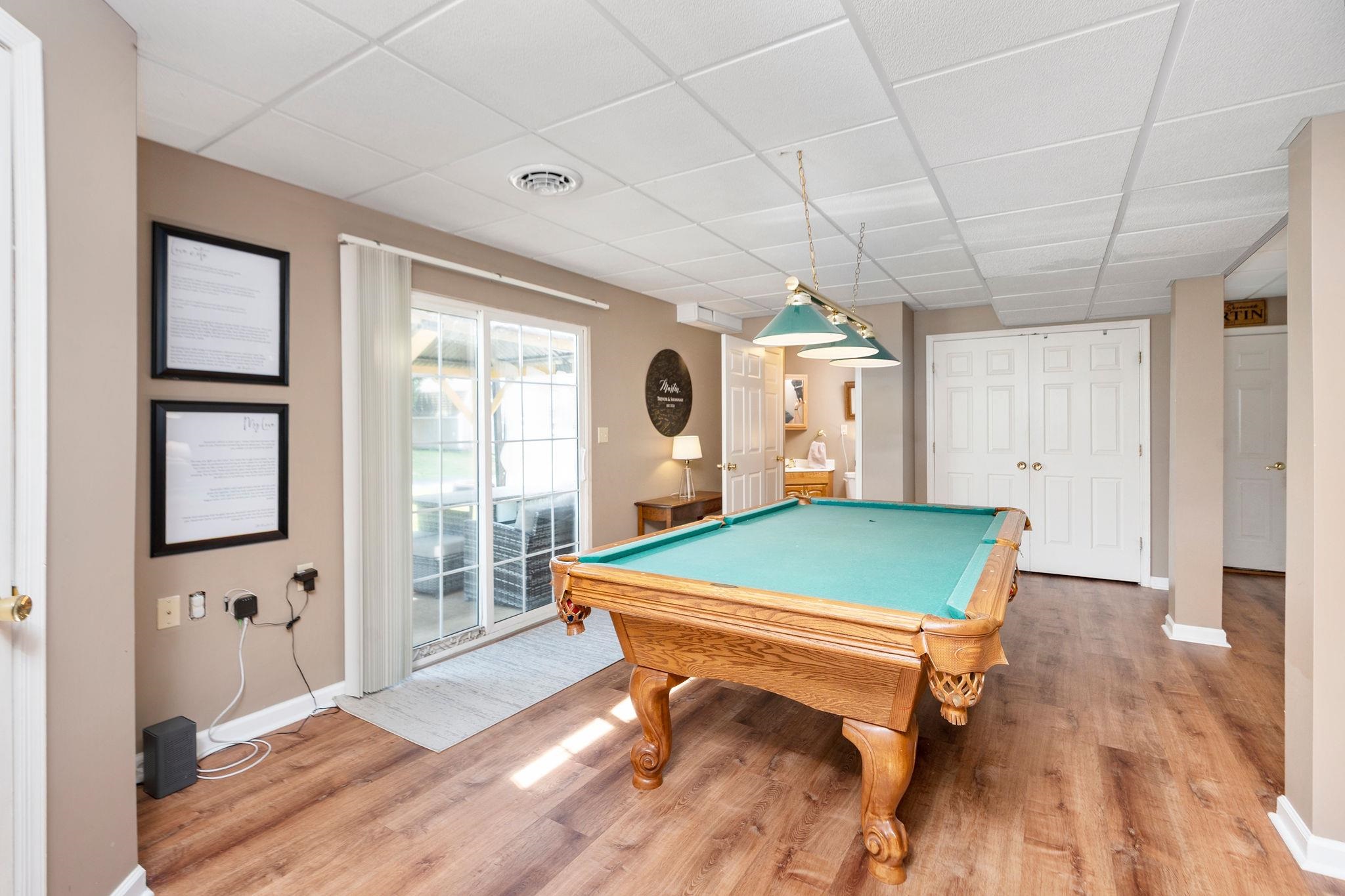 162 Cold Springs Road Stuarts Draft, VA 24477 - Photo 25 of 33 a room with pool table and windows