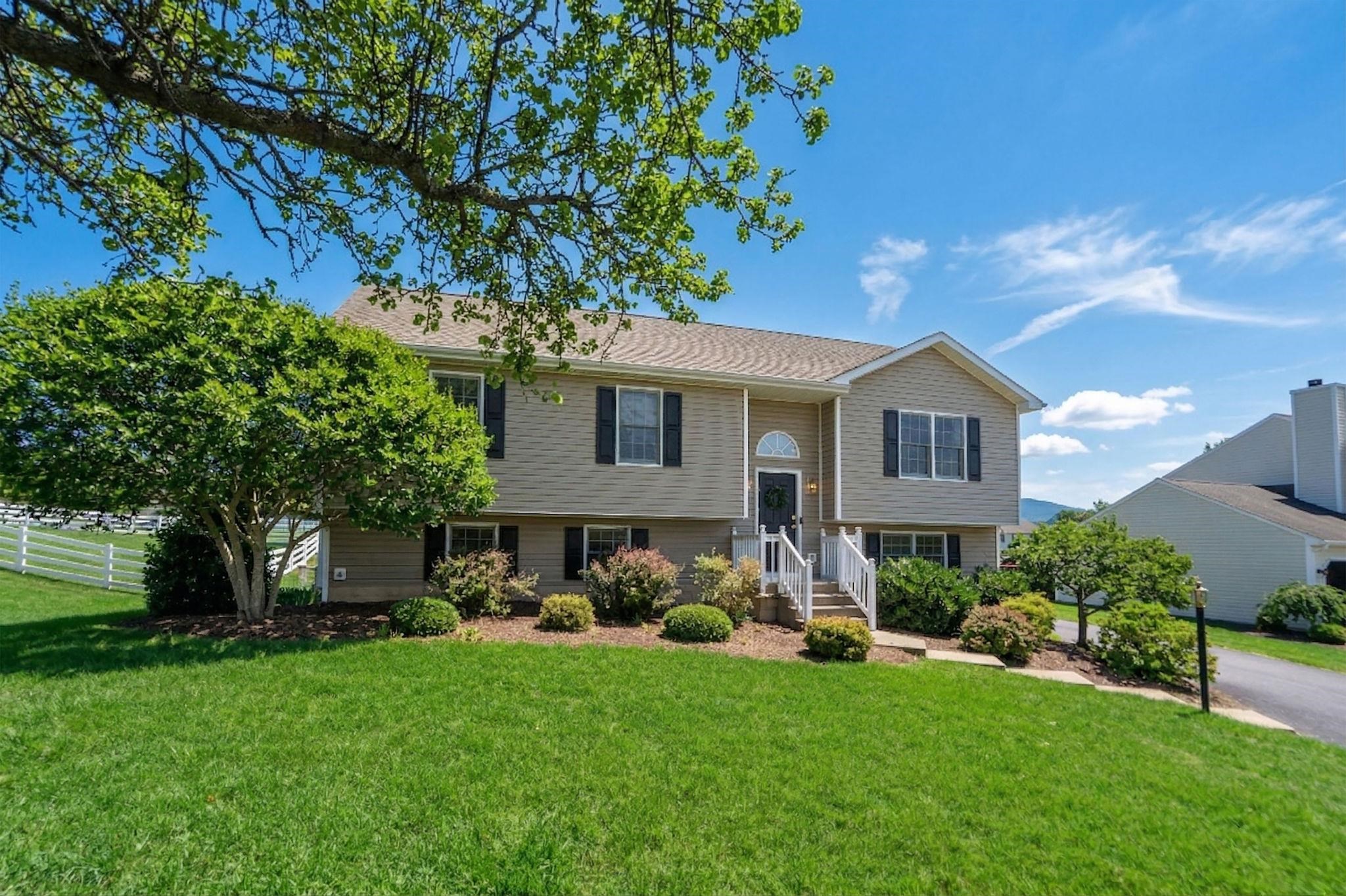 162 Cold Springs Road Stuarts Draft, VA 24477 - Photo 3 of 33 a front view of a house with a yard and trees