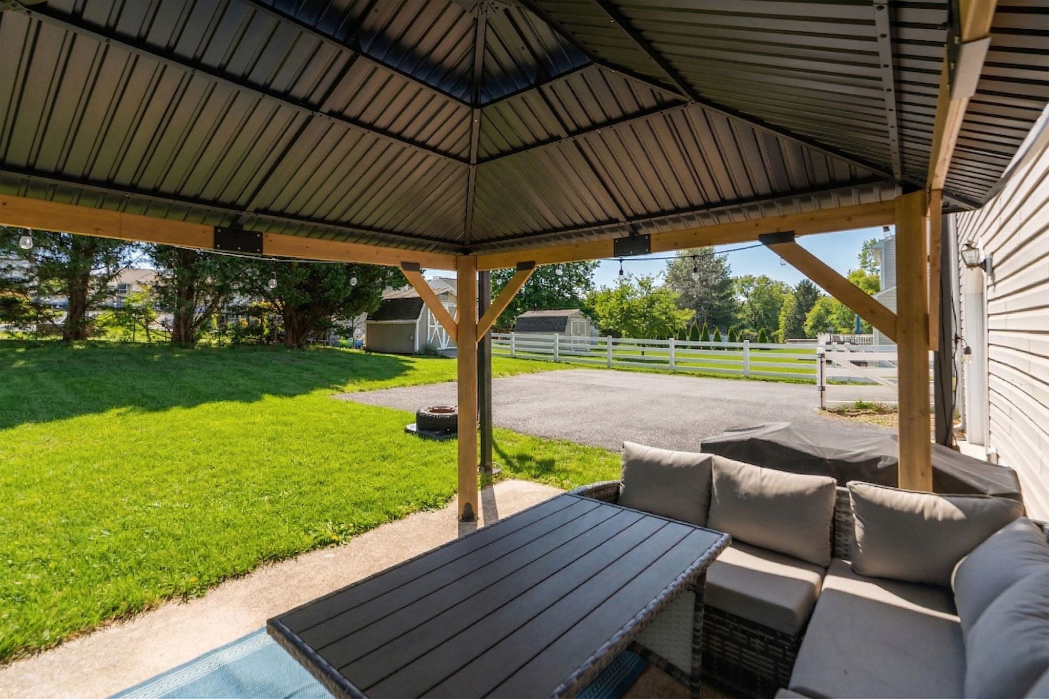 162 Cold Springs Road Stuarts Draft, VA 24477 - Photo 31 of 33 a view of a couches in patio with a yard