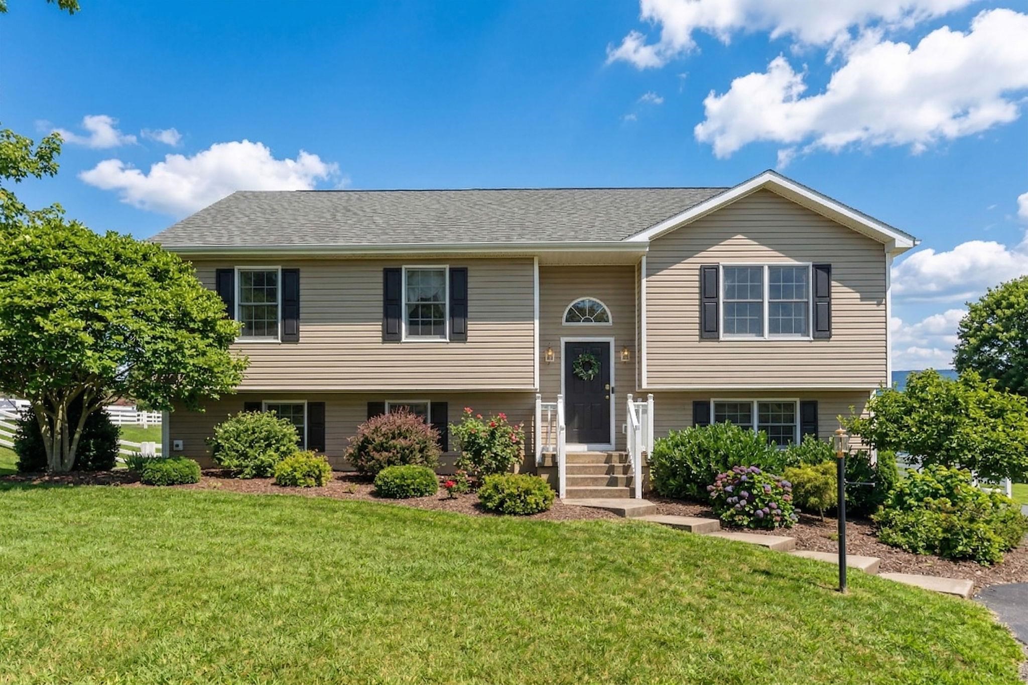 162 Cold Springs Road Stuarts Draft, VA 24477 - Photo 4 of 33 a front view of house with yard and green space