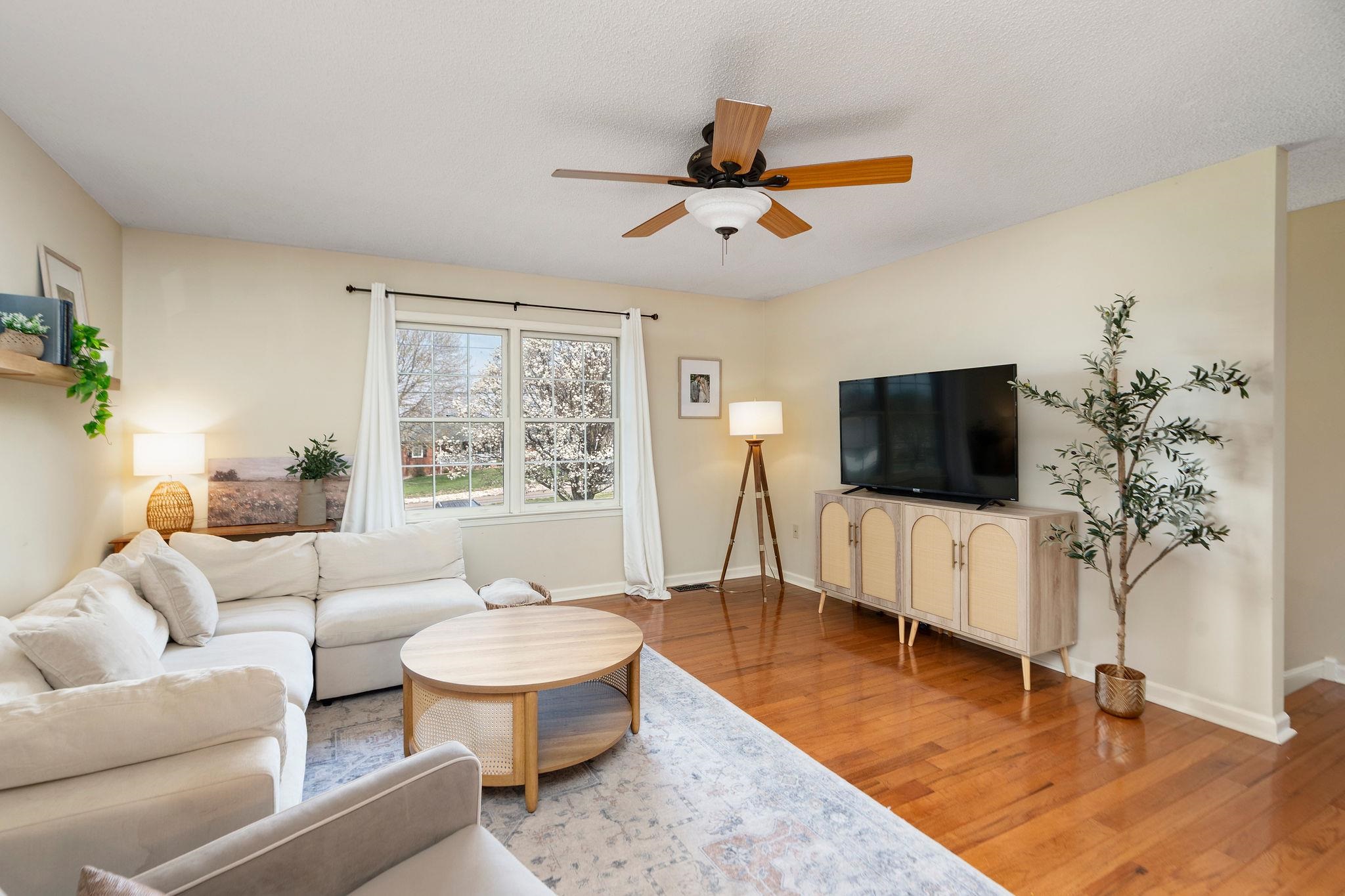 162 Cold Springs Road Stuarts Draft, VA 24477 - Photo 5 of 33 a living room with furniture and a flat screen tv