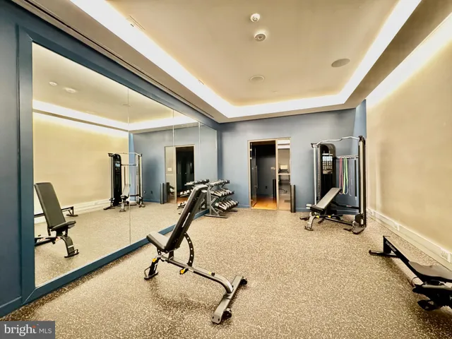 a view of a room with gym equipment