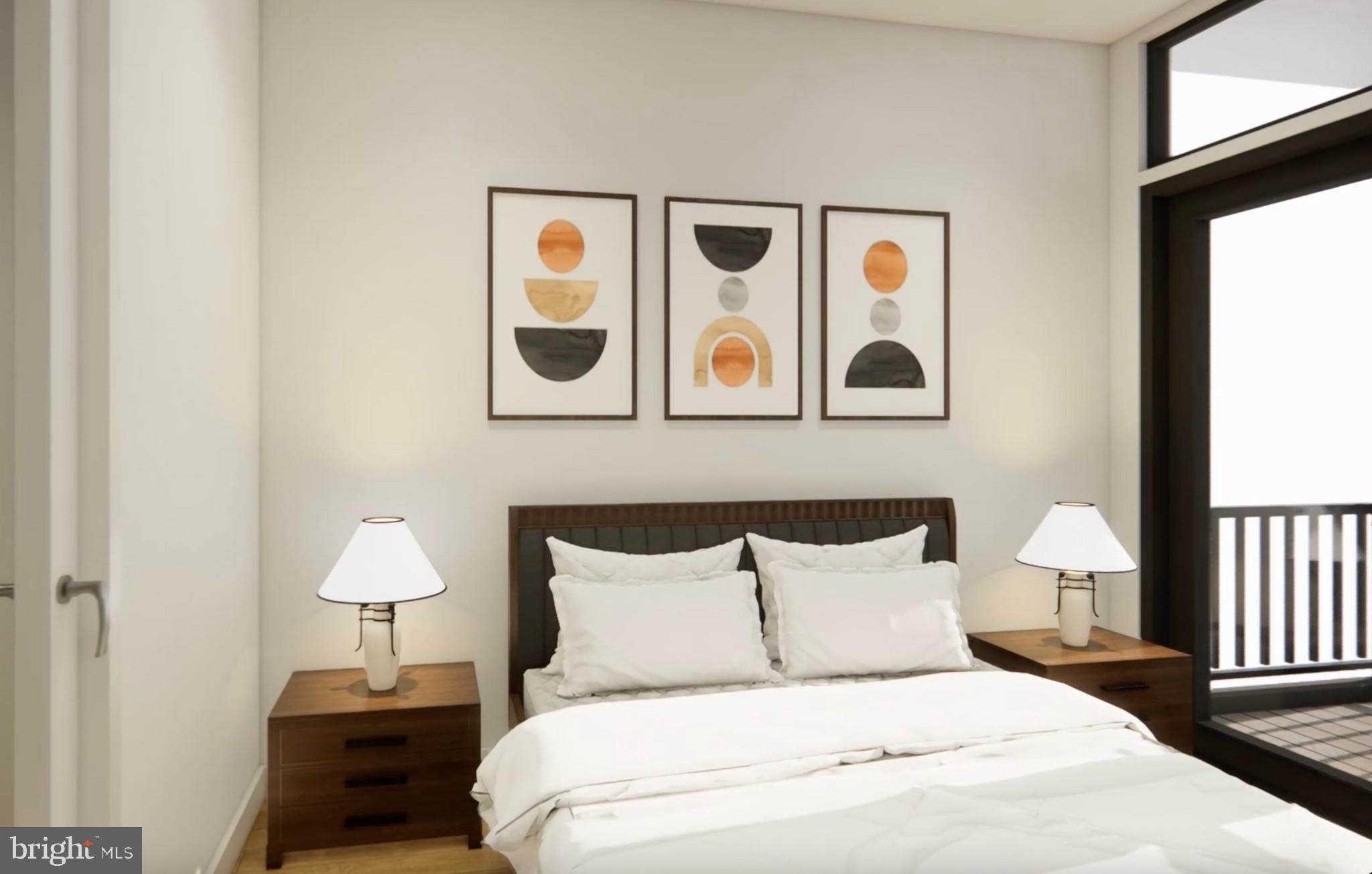 7175 12th Street Northwest, Unit 608 Washington, DC 20012 - Photo 4 of 24 a bedroom with a bed and a lamp on table