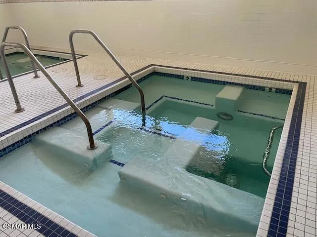 wooden floor in a gallery with a bathroom
