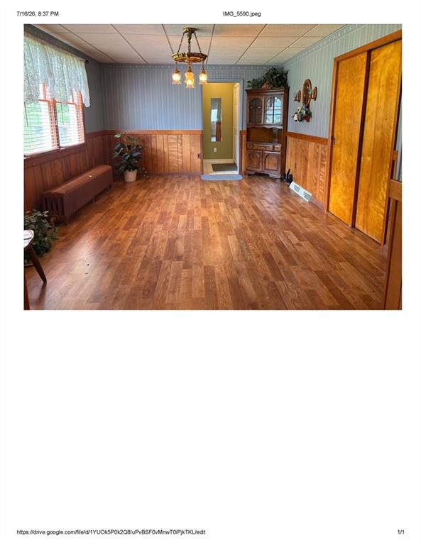 1139-1143 New Stanton Ruffsdale Road, Unit CYNKAR Ruffs Dale, PA 15679 - Photo 5 of 29 a living room with furniture and a wooden floor