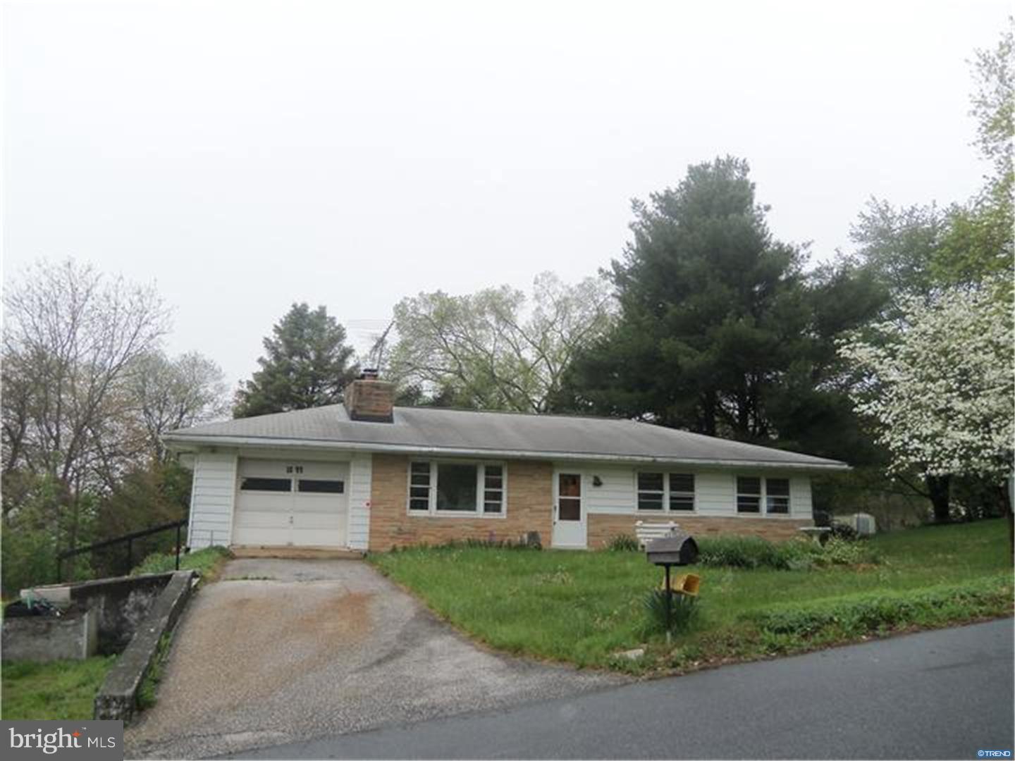 1644 Exeter Road Westminster, MD 21157 - Photo 1 of 4 a front view of a house with a garden