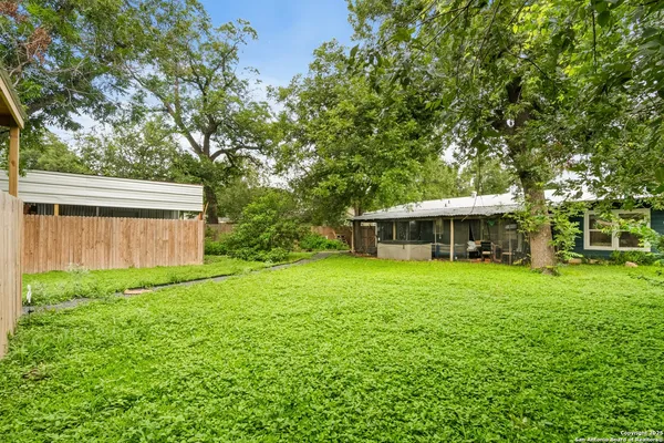 a view of a house with a garden