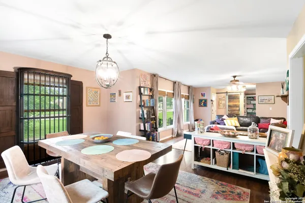 a view of a dining room with furniture window and outside view