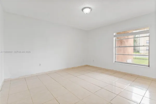 a bathroom with a shower and toilet