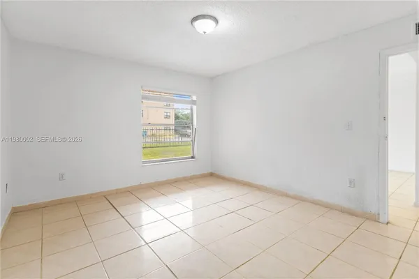 a bathroom with a shower and toilet