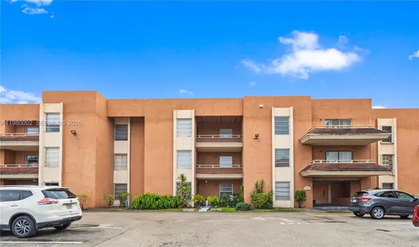 a view of swimming pool with a outdoor seating