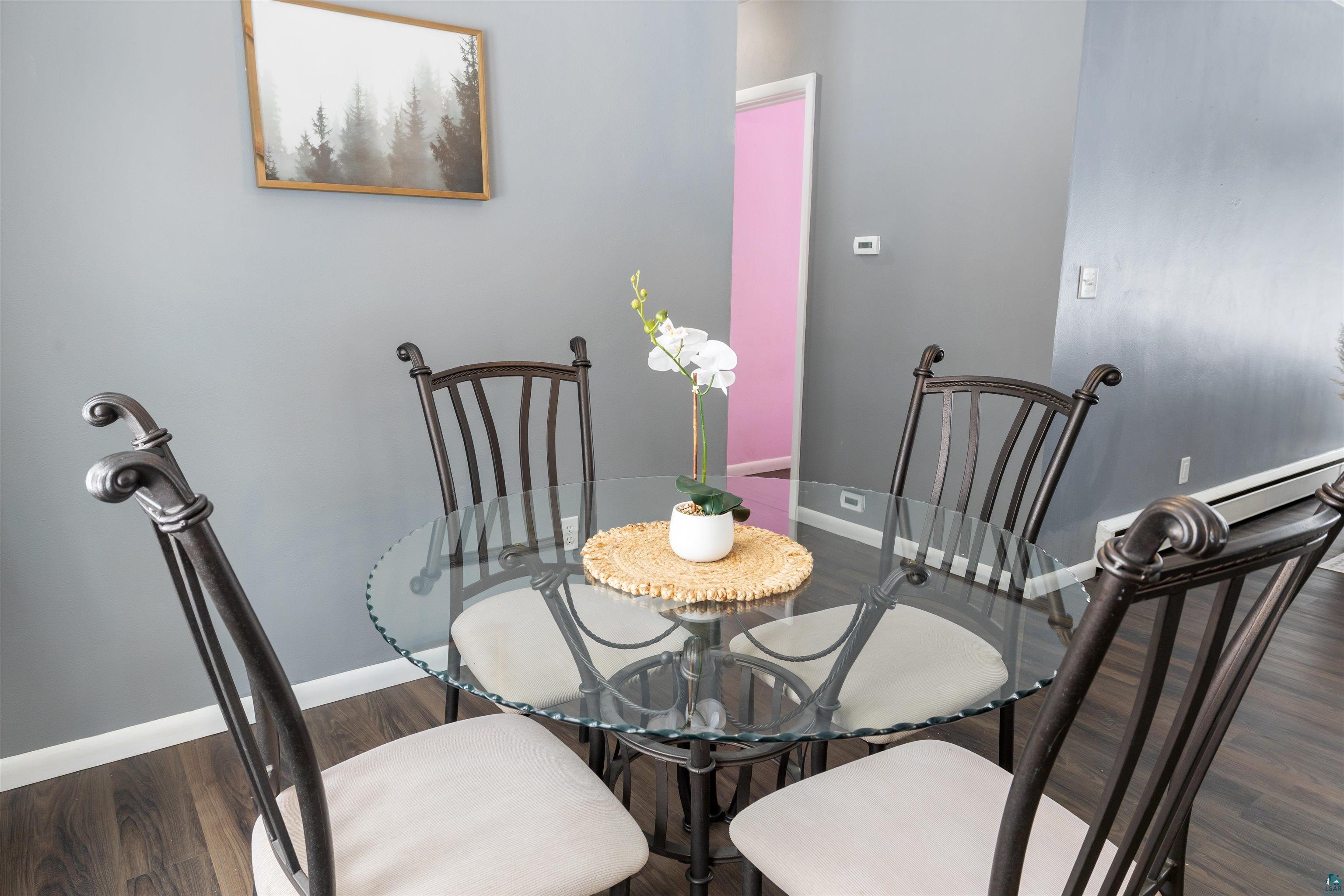 1101 13th Street South Virginia, MN 55792 - Photo 14 of 43 Dining room featuring dark laminate flooring