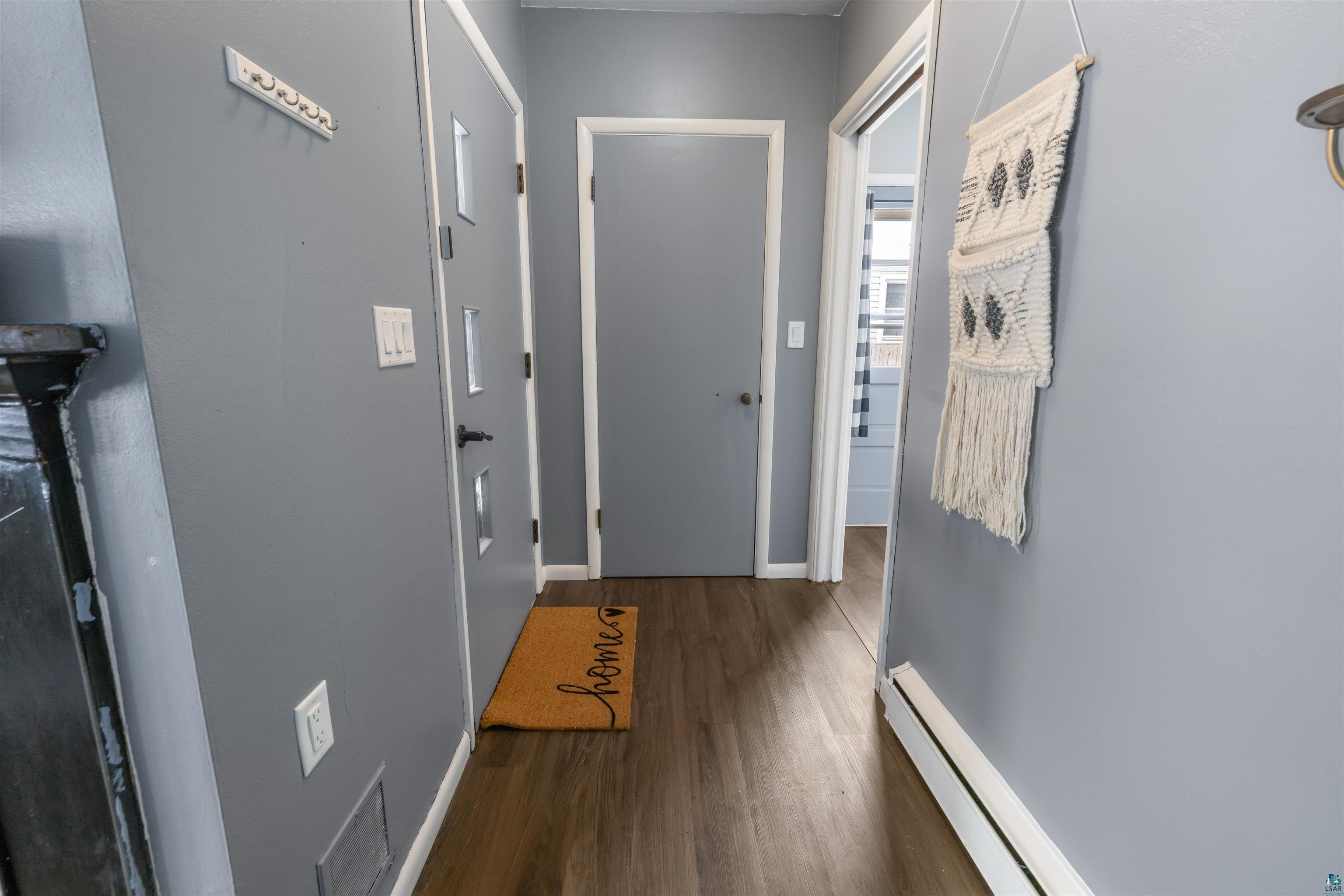 1101 13th Street South Virginia, MN 55792 - Photo 18 of 43 Entry way with dark laminate finished floors