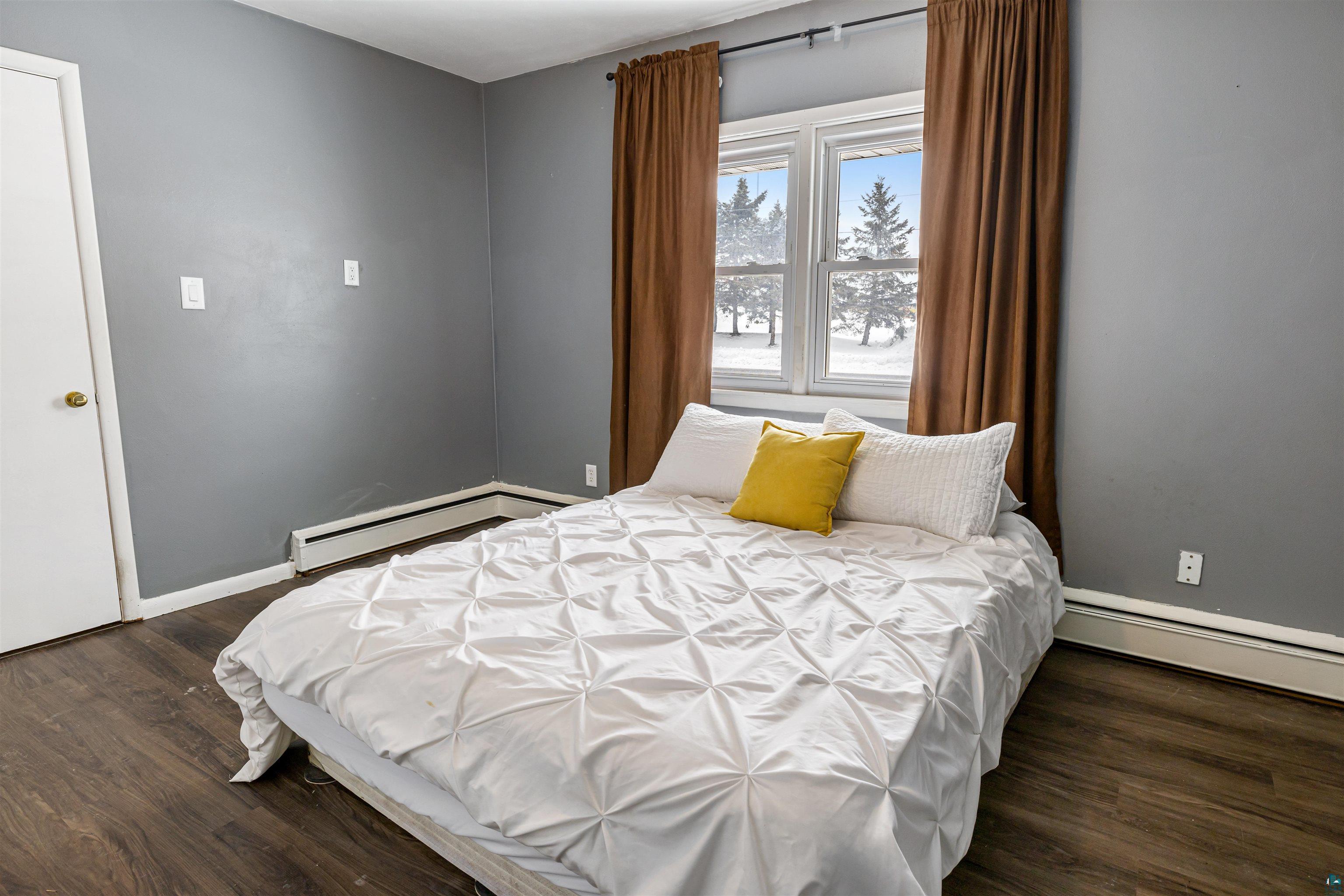 1101 13th Street South Virginia, MN 55792 - Photo 19 of 43 Bedroom featuring dark laminate finished floor