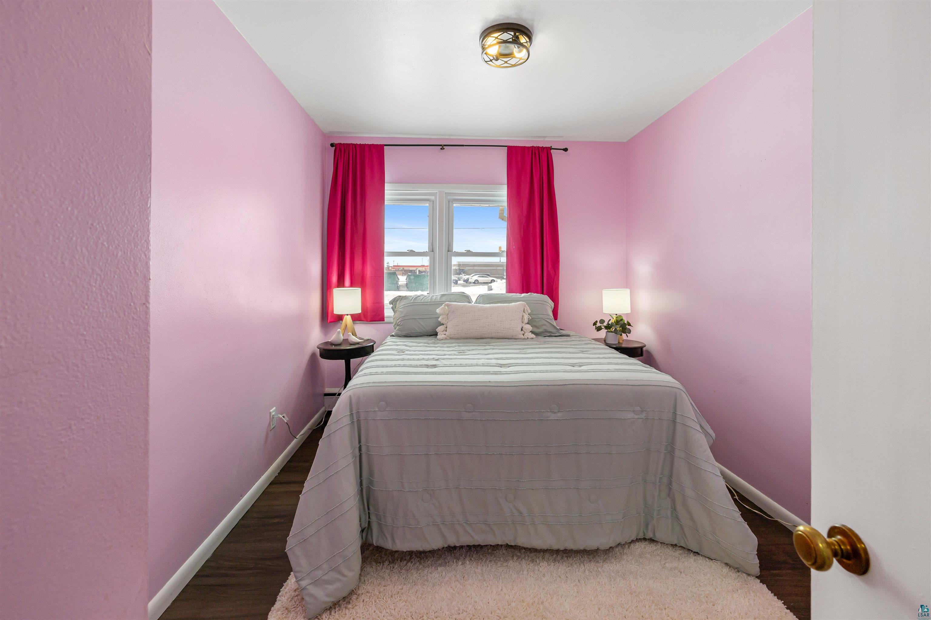 1101 13th Street South Virginia, MN 55792 - Photo 22 of 43 Bedroom with dark laminate finished floor