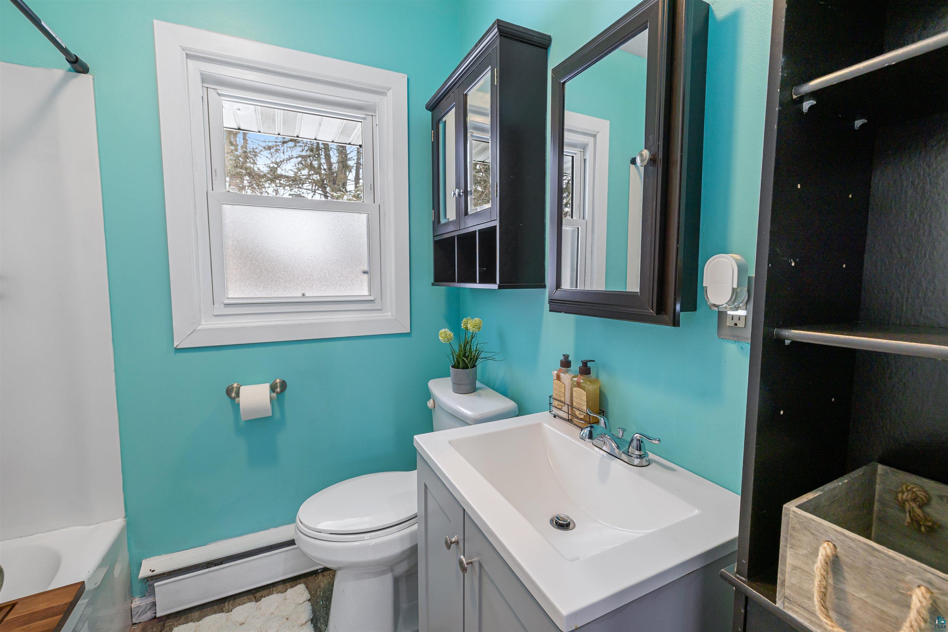 1101 13th Street South Virginia, MN 55792 - Photo 27 of 43 Bathroom with vanity, and shower / bathtub combination (full bath)