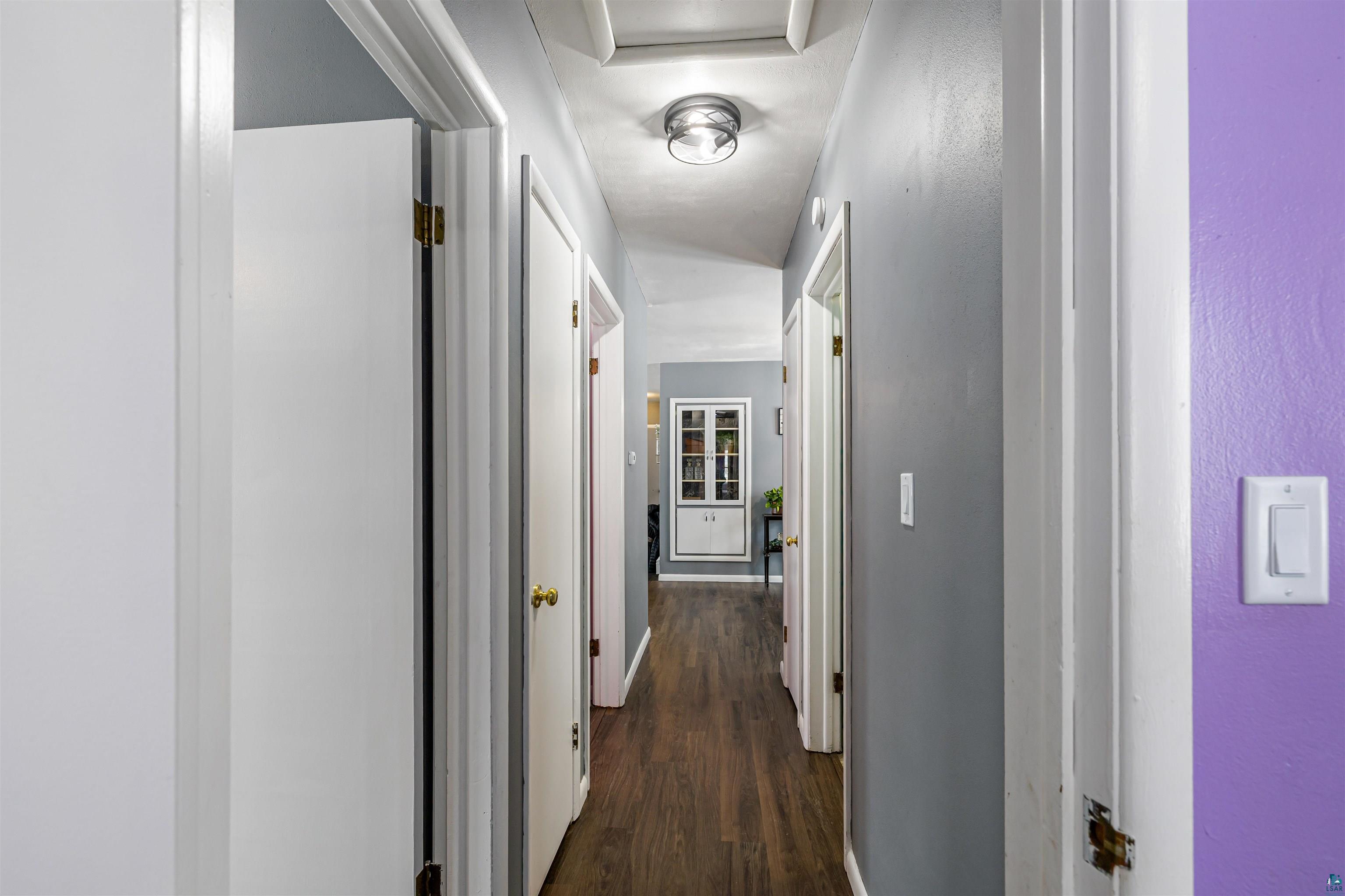 1101 13th Street South Virginia, MN 55792 - Photo 29 of 43 Hall featuring dark laminate finished floor