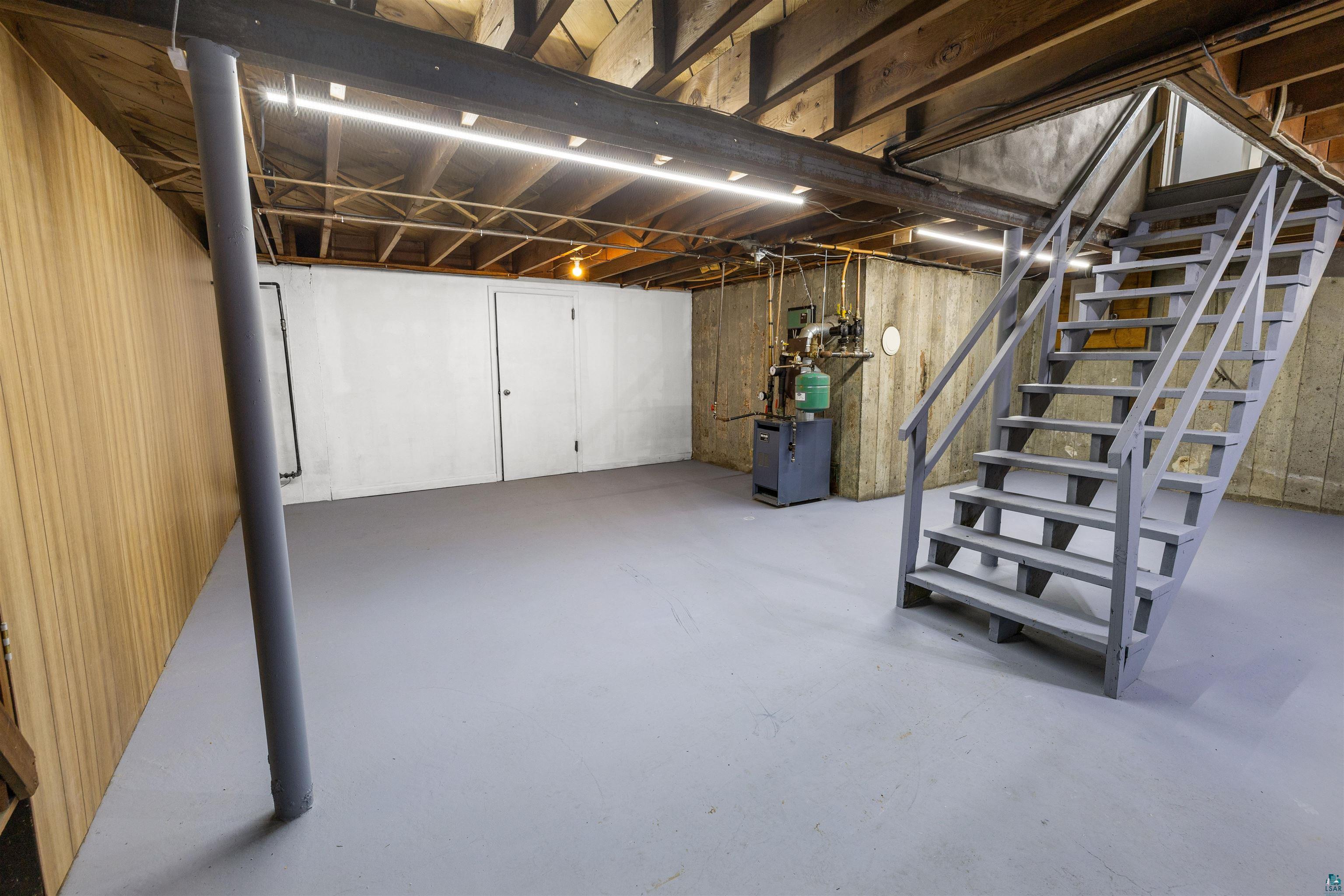1101 13th Street South Virginia, MN 55792 - Photo 31 of 43 Unfinished basement with stairway