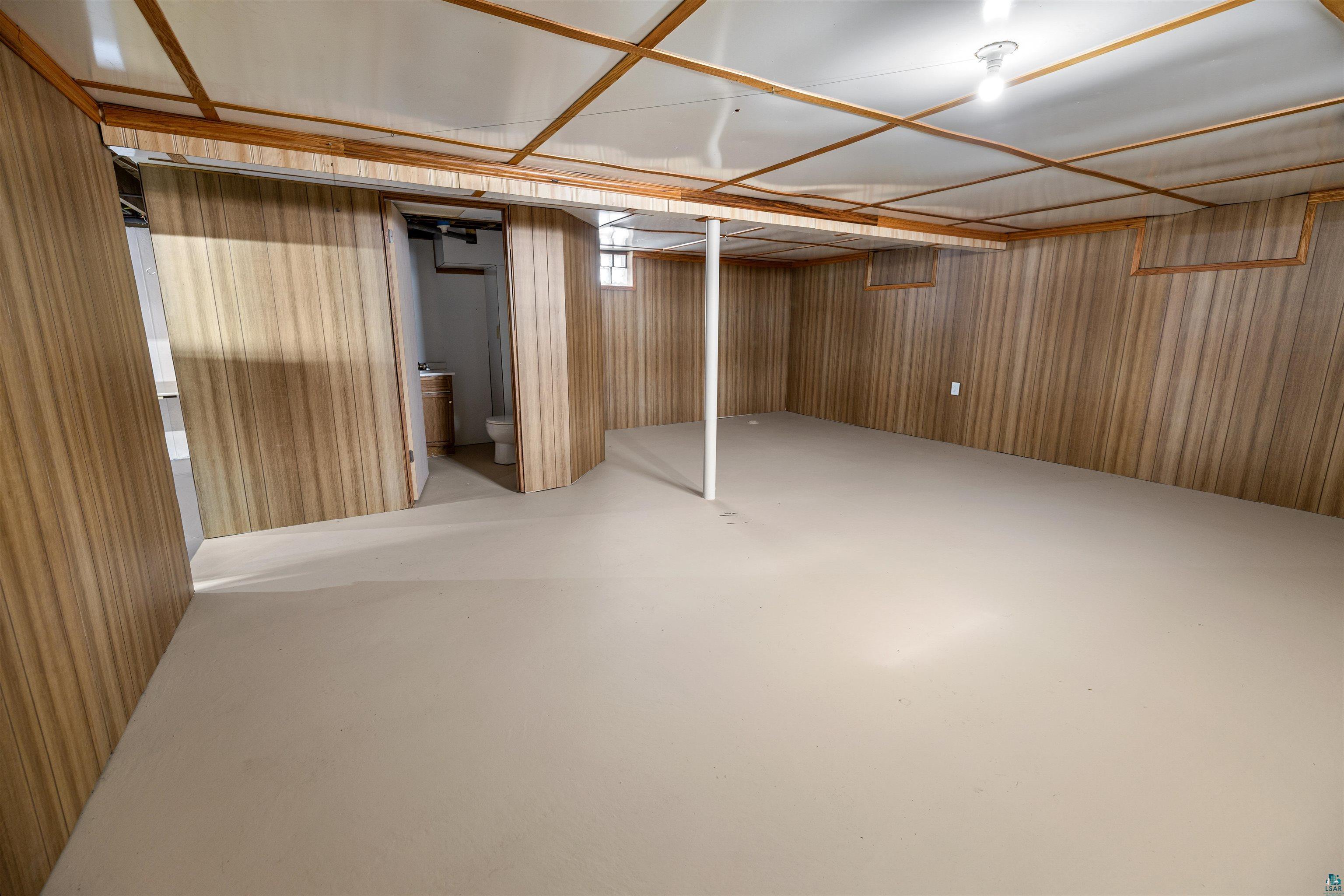 1101 13th Street South Virginia, MN 55792 - Photo 33 of 43 Finished below grade area with paneled walls