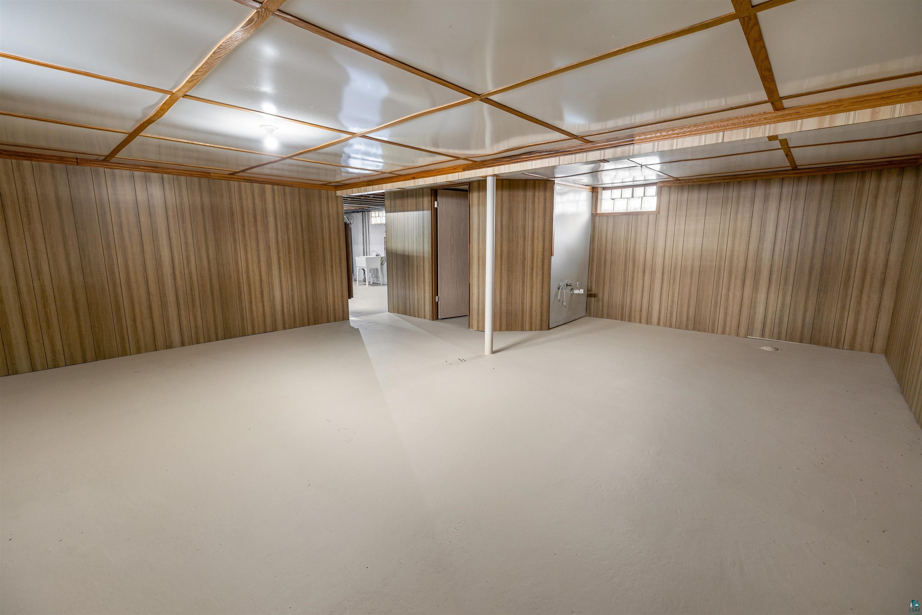 1101 13th Street South Virginia, MN 55792 - Photo 34 of 43 Basement with paneled walls