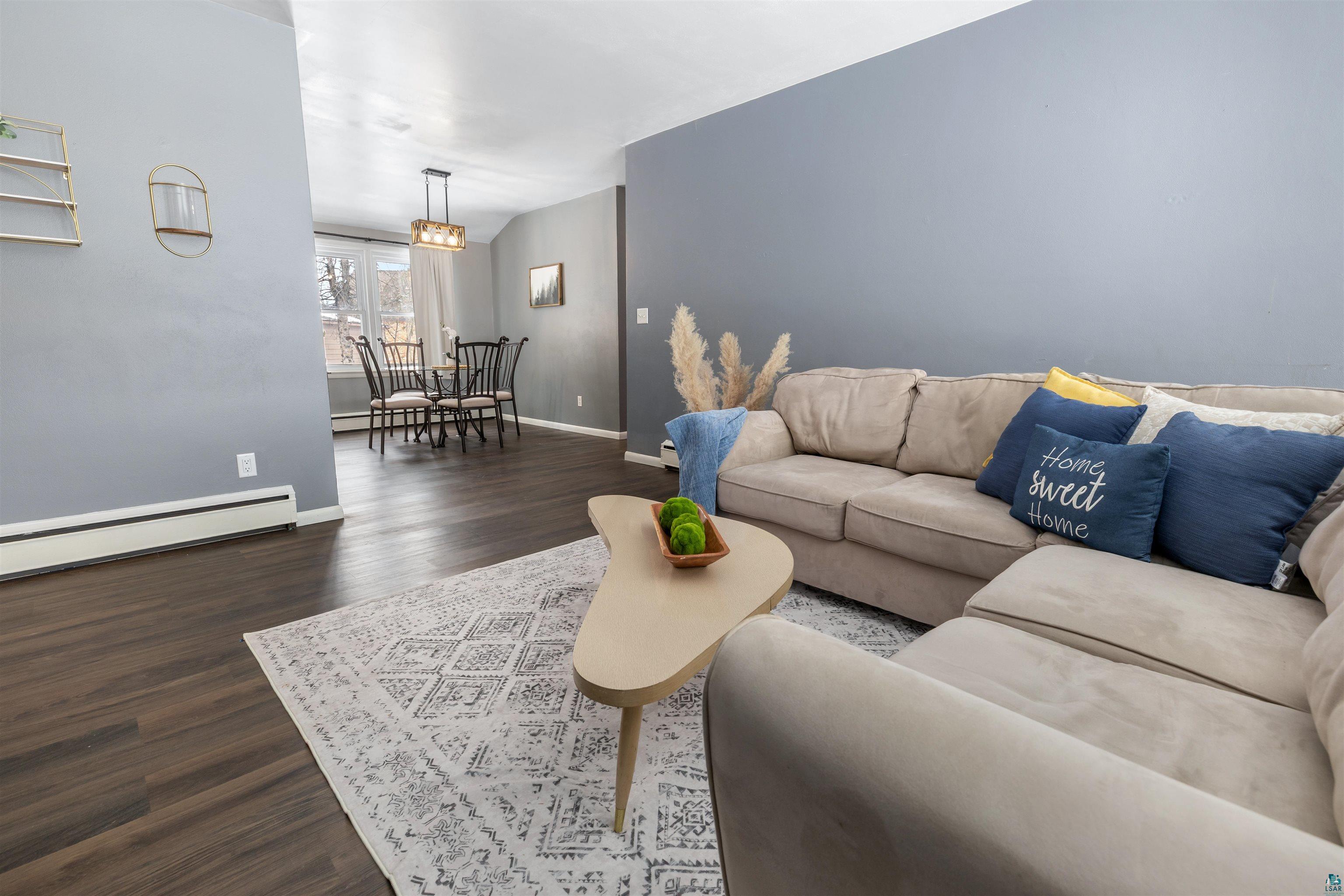 1101 13th Street South Virginia, MN 55792 - Photo 7 of 43 Living room featuring dark laminate flooring