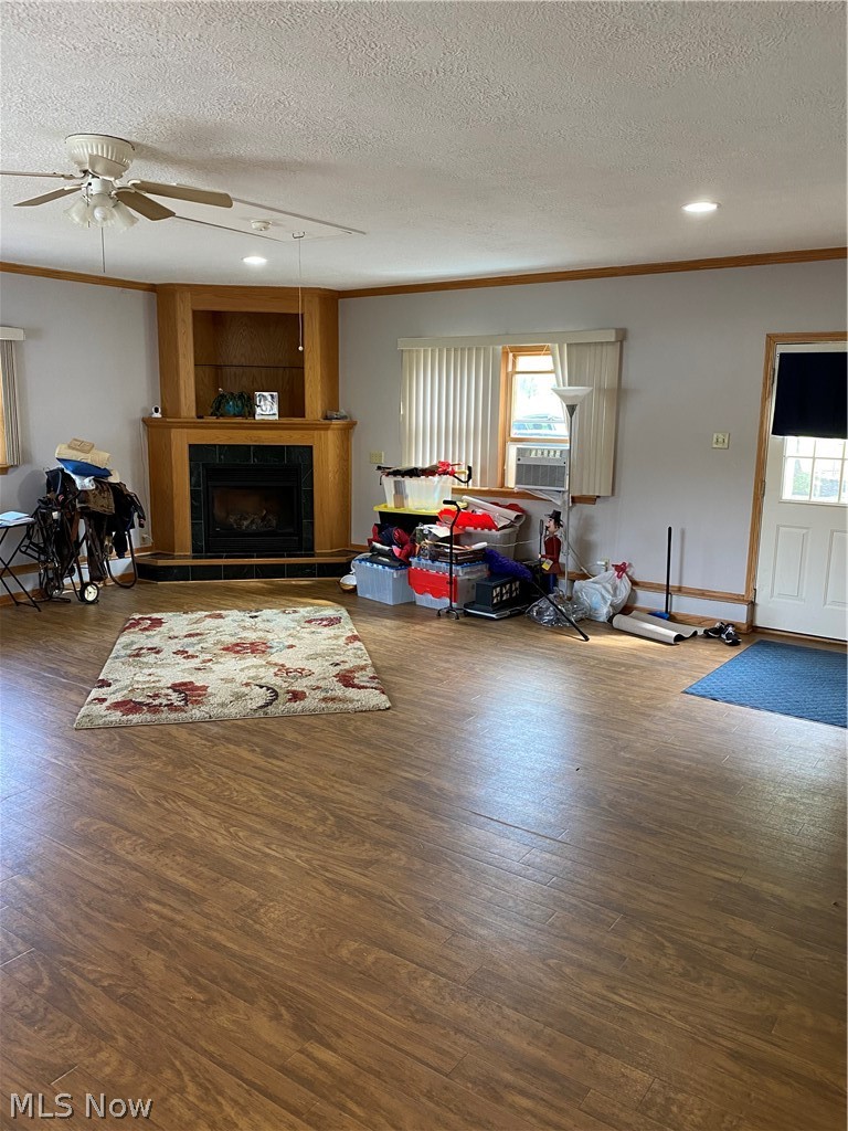 7706 Sanborn Road Ashtabula, OH 44004 - Photo 10 of 35 Great room with laminate flooring and gas fireplace.
