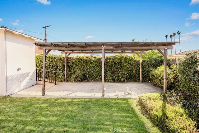a view of a room with a big yard
