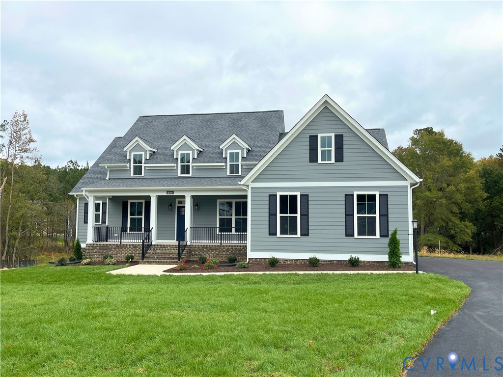 18201 Well House Terrace Moseley, VA 23120 - Photo 1 of 1 a front view of house with yard and green space