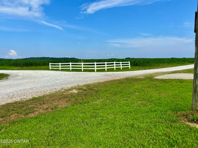 a view of an ocean beach and a building
