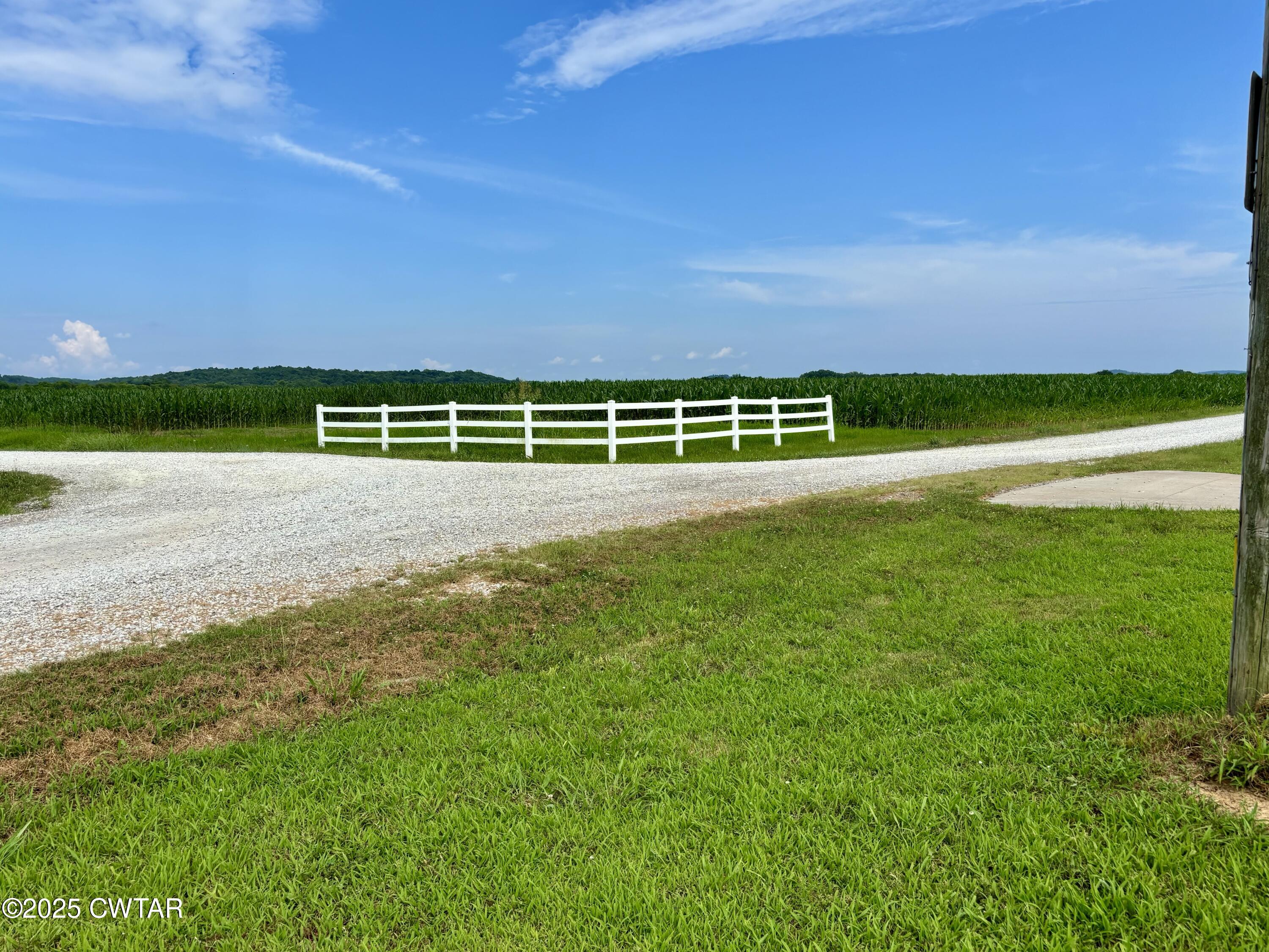 995 Hardin Bottom River Road Clifton, TN 38425 - Photo 3 of 8 a view of an ocean beach and a building