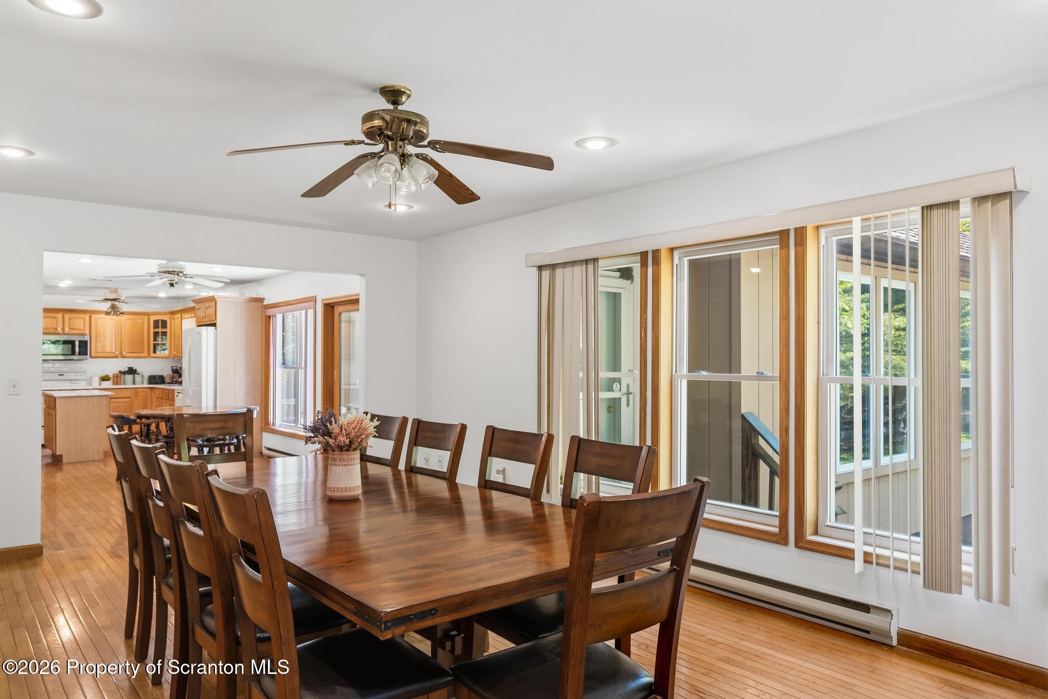 58 Bender Road Gouldsboro, PA 18424 - Photo 15 of 55 a view of a dining room with furniture window and wooden floor