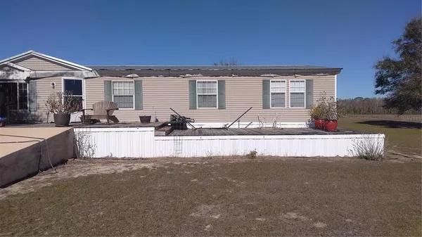 a front view of a house with entertaining space