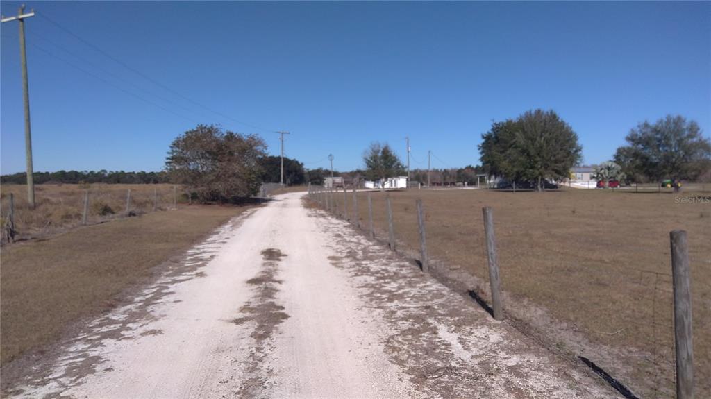 12051 Avon Park Cut Off Road Fort Meade, FL 33841 - Photo 8 of 10 a view of outside space and yard