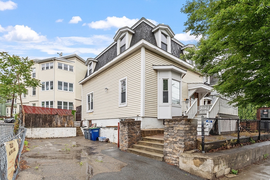 7 Washington Street Somerville, MA 02143 - Photo 1 of 27 a view of a house with a flat outdoor space