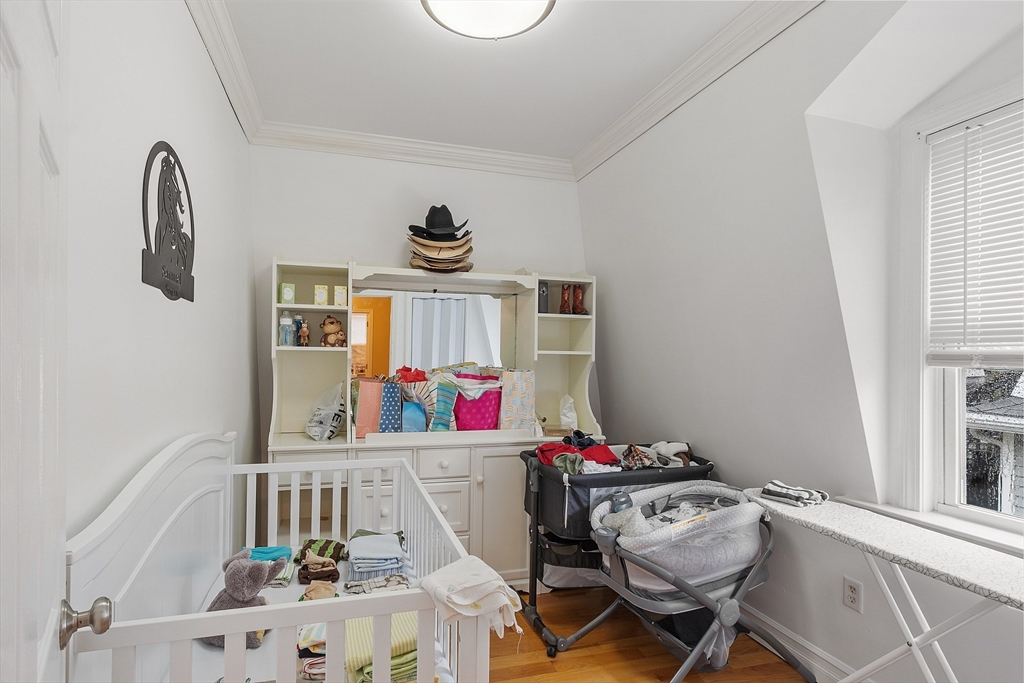 7 Washington Street Somerville, MA 02143 - Photo 26 of 27 a view of a workspace with furniture and a window